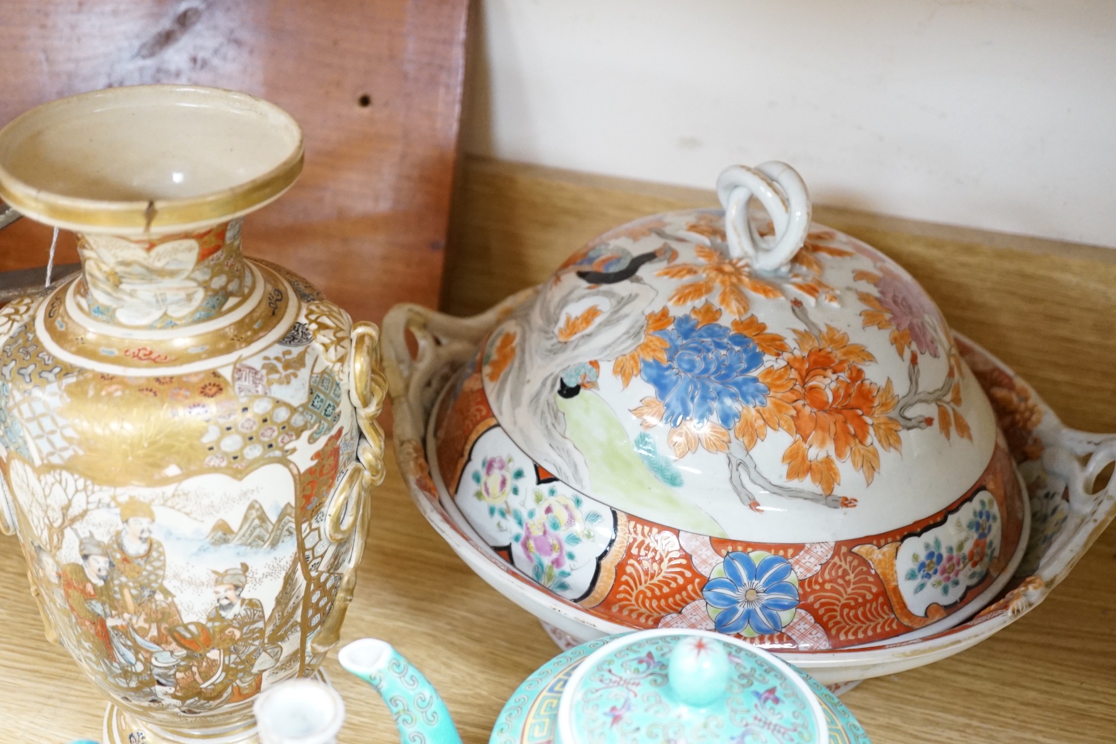 Japanese ceramics to include a Satsuma vase, 25 cm high, a Kutani style tureen and cover, a koransha bottle vase, together with a Chinese tea pot and two figures of ducks